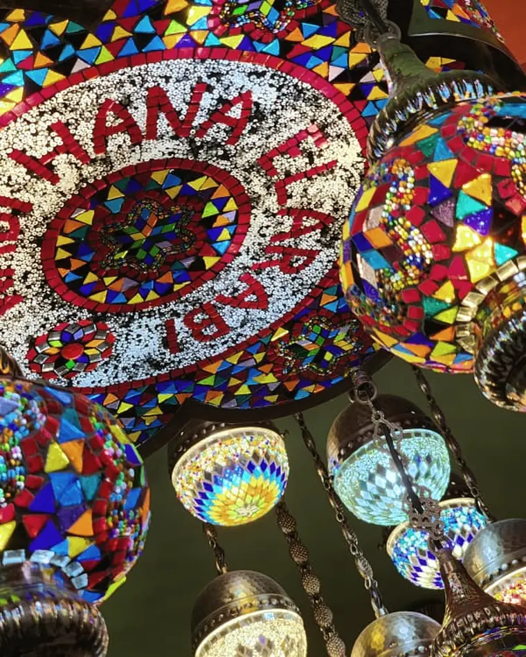 Mosaic lamps and the Wadi Hana Elarabi emblem inside the restaurant in Taman Desa Rahmat, Johor Bahru